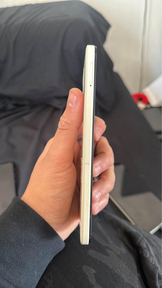 E13 CON CAJA Y CARGADOR