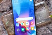 Xiaomi Redmi 9T libre con funda impecable