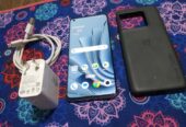 Oneplus 10 pro vendo o permuto solo detalle tapa trasera después todo bien