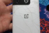 Oneplus 10 pro vendo o permuto solo detalle tapa trasera después todo bien