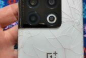 Oneplus 10 pro vendo o permuto solo detalle tapa trasera después todo bien